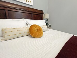 1 bedroom, desk, iron/ironing board, travel crib