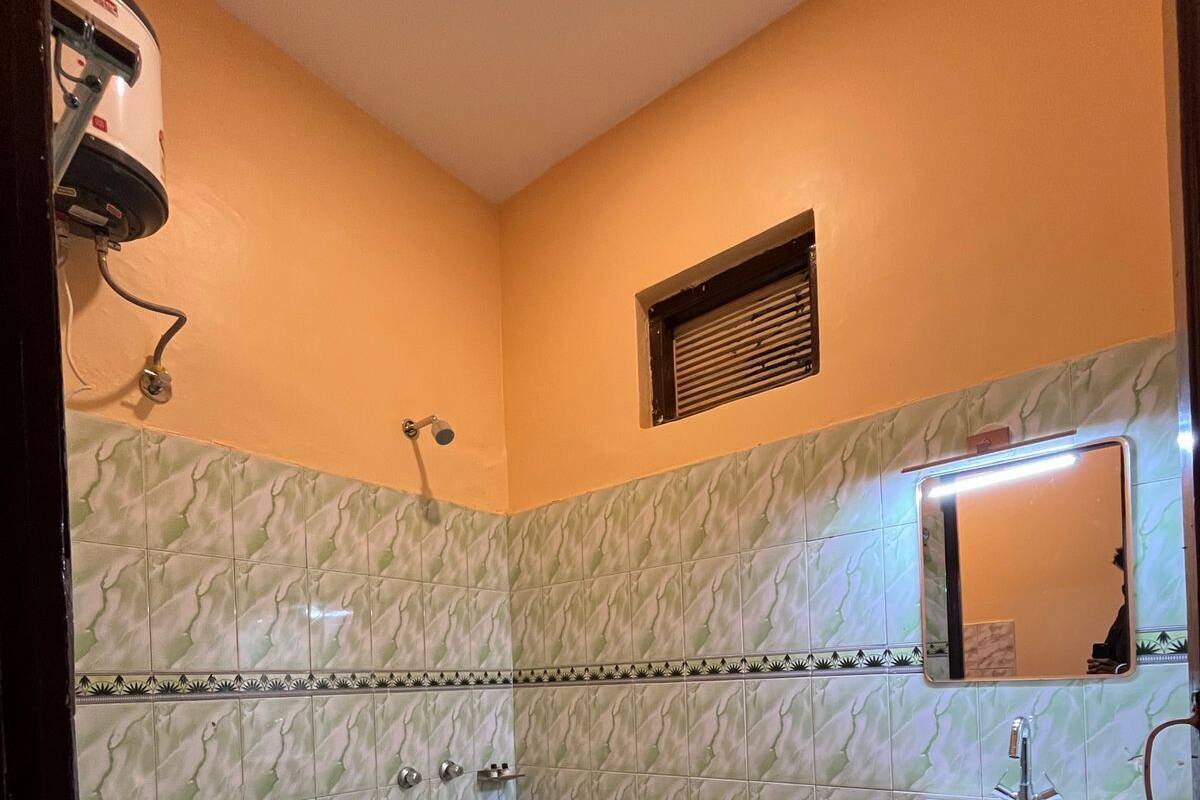 Shower, free toiletries, slippers, towels