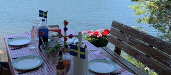 Secluded gem on an island in the Stockholm archipelago, forest plot and private jetty,