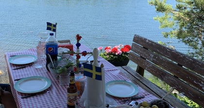 Secluded gem on an island in the Stockholm archipelago, forest plot and private jetty,