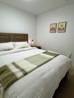 Suite, 2 habitaciones | 2 dormitorios, tabla de planchar con plancha, wifi gratis