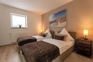 2 bedrooms, desk, iron/ironing board, travel cot