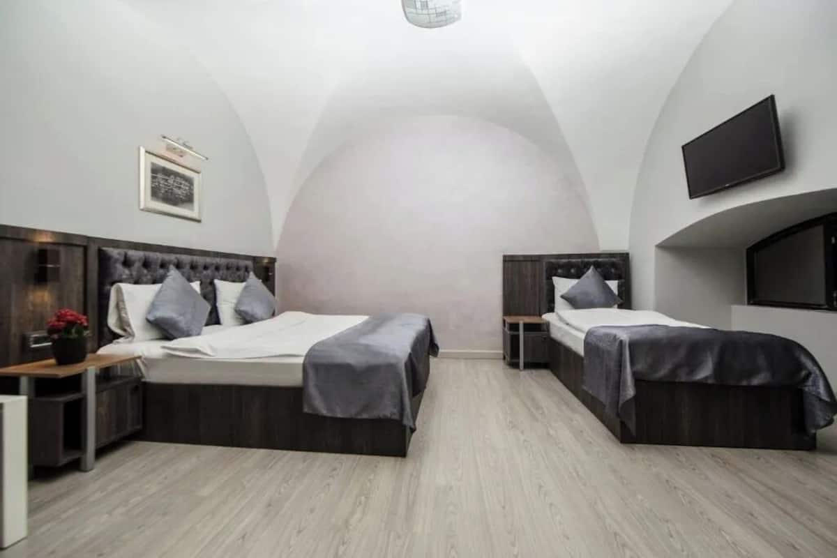 Family Triple Room, City View | 1 bedroom, premium bedding, minibar, in-room safe