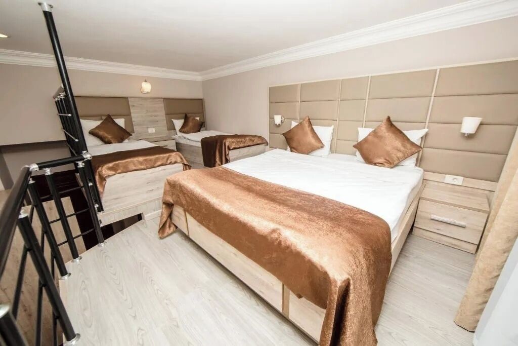 ファミリー デュープレックス バルコニー シティビュー | 高級寝具、ミニバー、セーフティボックス (室内)、客室ごとに異なる装飾