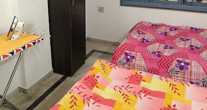 Chintamani -bed Sharing apartment with fitness Area, WiFi in superb Ahmedabad