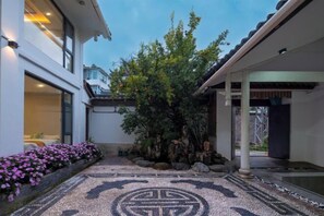 Garden - Xinniu Inn (Lijiang Ancient City Dashuiche Shop) (Lijiang)