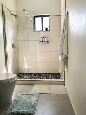 Shower, towels, soap, shampoo