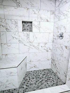 Shower, towels, soap, toilet paper