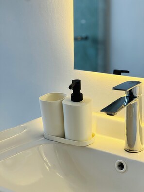 Shower, towels, toilet paper
