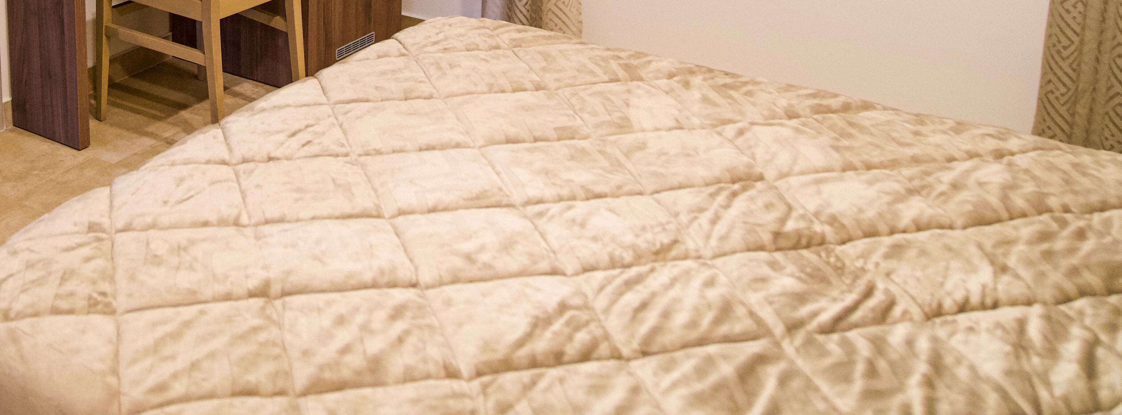 Egyptian cotton sheets, premium bedding, down duvets, memory-foam beds