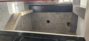 Shower, towels, soap, toilet paper