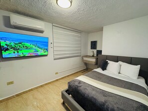 3 habitaciones, tabla de planchar con plancha y cuna de viaje 