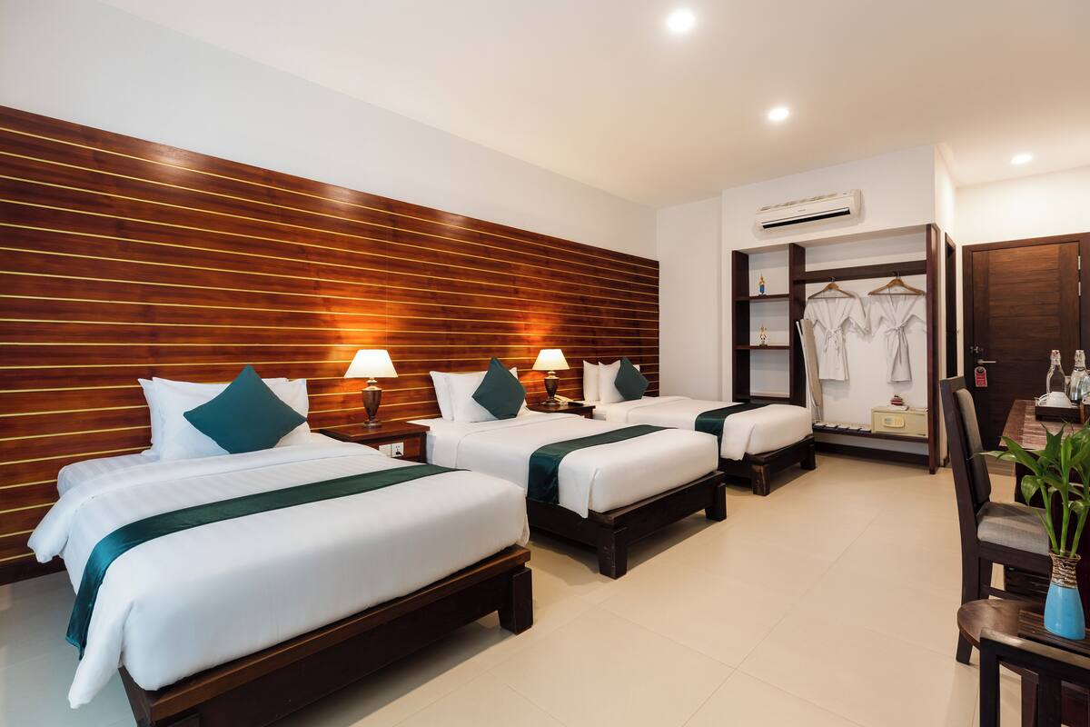 Deluxe Triple Room | 1 bedroom, minibar, laptop workspace, free WiFi