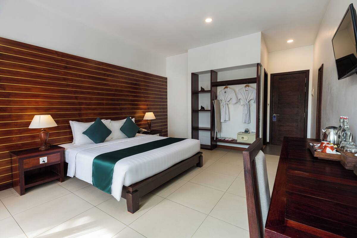 Deluxe Double Room, 1 Bedroom, Pool View | 1 bedroom, minibar, laptop workspace, free WiFi