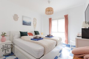 2 habitaciones, tabla de planchar con plancha y cuna de viaje 