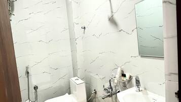 Shower, slippers, towels, soap