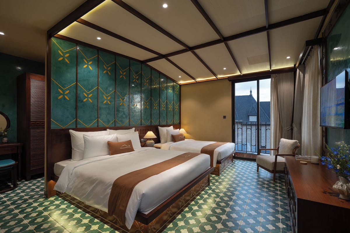 Triple Room, Balcony | Living area