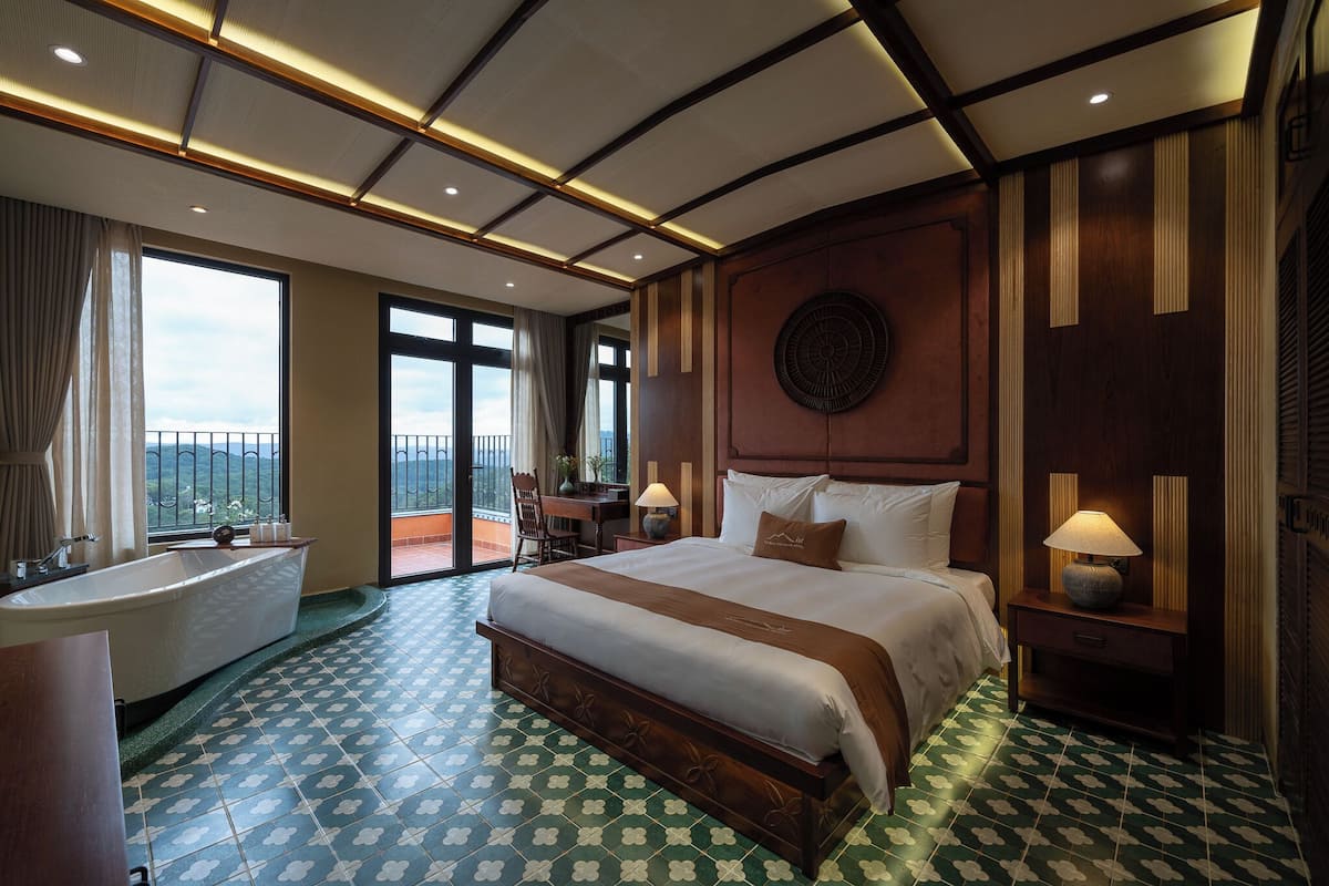 Phòng Suite Executive, quang cảnh núi | Bộ đồ giường cao cấp, minibar với thức ăn, đồ uống miễn phí 