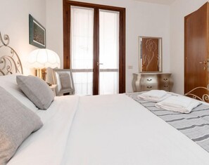 2 dormitorios, tabla de planchar con plancha, wifi y ropa de cama
