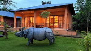 A building with a large, textured elephant sculpture in the front yard. - KAZIRANGA ECO VILLAGE RESORT (Kaliabar)