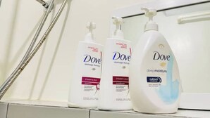Three Dove products on a bathroom shelf. - MARIA CONDO 19F Cebu High-Rise (Mandaue City)