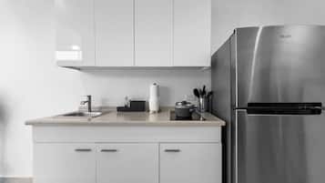 Fridge, microwave, stovetop, coffee/tea maker