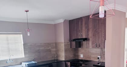 Lovely home away from home with WiFi located at an Estate in Centurion.