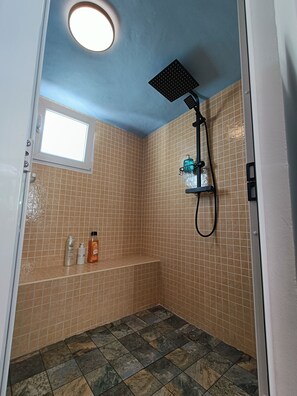 Shower, hair dryer, towels, soap