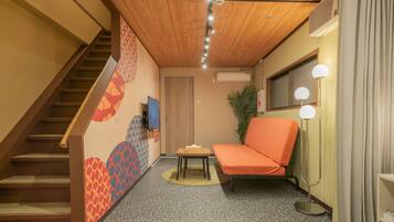 Comfort Villa | Living area | 42-inch TV with cable channels
