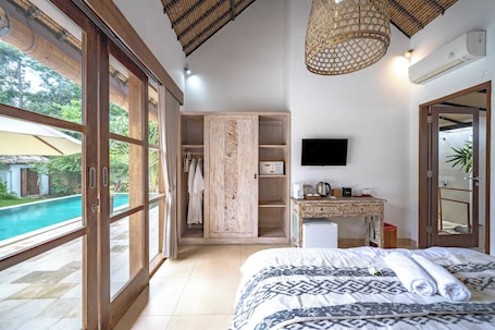 Suite, 1 Bedroom, Pool View | 1 bedroom, Egyptian cotton sheets, premium bedding, in-room safe