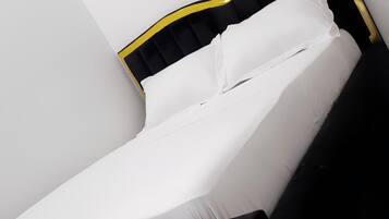 Quarto casal conforto | 2 quartos, cortinas blackout, ferros/tábuas de passar roupa