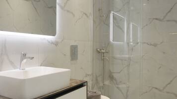 Shower, free toiletries, hair dryer, bathrobes