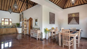 Family Villa, Pool View | Living area | 40-inch flat-screen TV with cable channels, TV