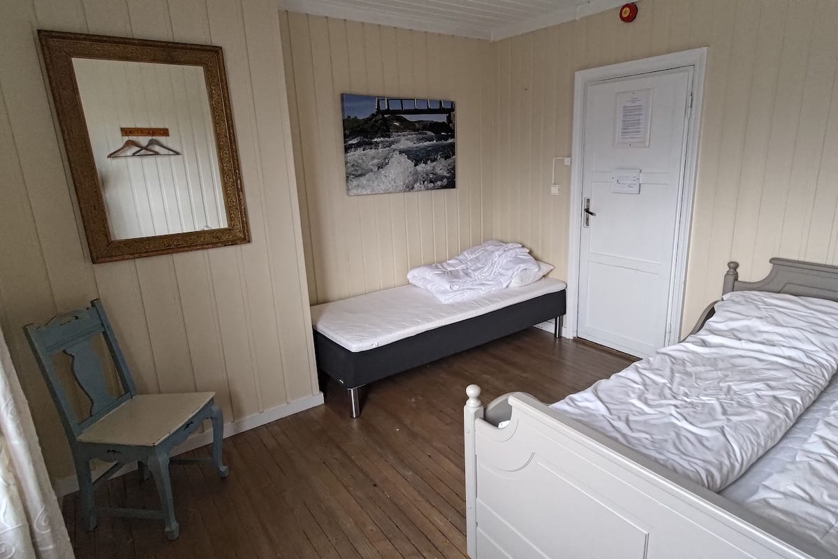 Basic Triple Room, Lake View | Pillowtop beds, free WiFi