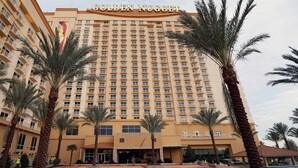 A large hotel building with a sign reading 'Golden Nugget.'