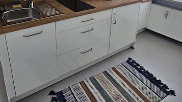 Fridge, coffee/tea maker, toaster, dining tables