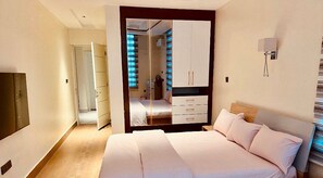 Luxury Apartment, Balcony, City View | 1 bedroom, desk, laptop workspace, blackout drapes