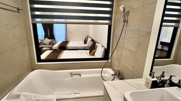 Luxury Apartment, Beach View (20-13) | Bathroom | Shower, rainfall showerhead, free toiletries, hair dryer