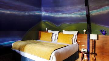 Habitación Deluxe | Caja de seguridad en la habitación y tabla de planchar con plancha