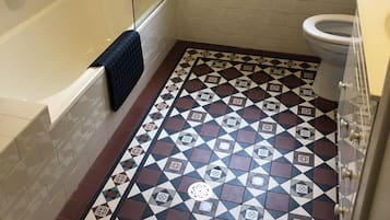 Shower, towels, soap, toilet paper