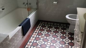 Shower, towels, soap, toilet paper