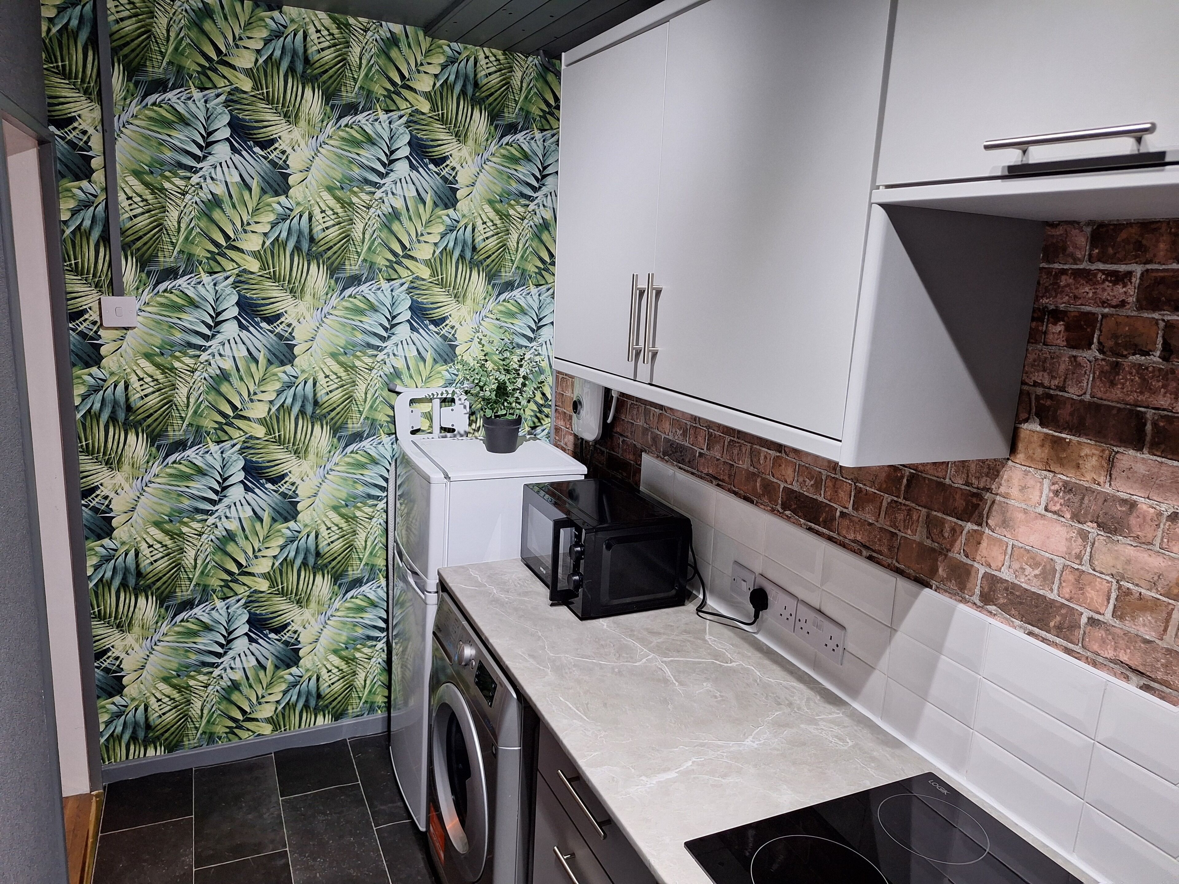 Fridge, microwave, stovetop, coffee/tea maker