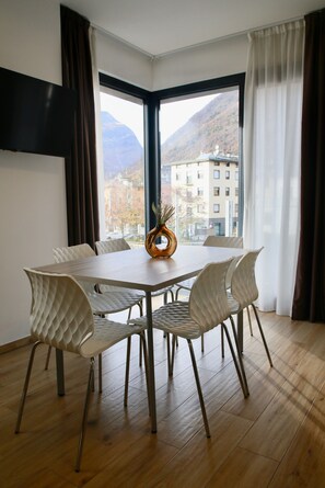 Apartment, Balcony, Mountain View | Living area | Smart TV - Bernina Suites - vicino al Bernina Express - 2026 Winter Olympics (Tirano)