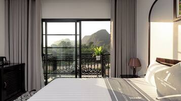 Deluxe Double Room, Balcony | Individually furnished, desk, laptop workspace, soundproofing