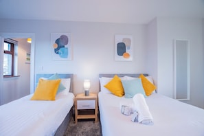 2 dormitorios, tabla de planchar con plancha, wifi y ropa de cama