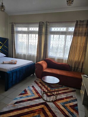 Deluxe Studio Suite, City View | Living area | 24-inch Smart TV with digital channels - Lux Suites Gish Studios Nyali (Mombasa)