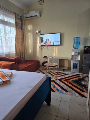 Deluxe Studio Suite, City View | Living area | 24-inch Smart TV with digital channels - Lux Suites Gish Studios Nyali (Mombasa)