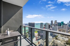 Outdoor dining - 51st-Floor Downtown Studio | Exclusive City Views (Downtown)