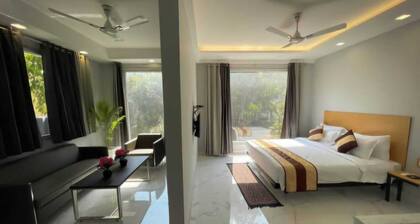 Luxury executive suite in Gurugram, featuring air conditioning and Wi-Fi.
