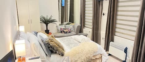1 dormitorio, tabla de planchar con plancha, cuna de viaje y wifi gratis